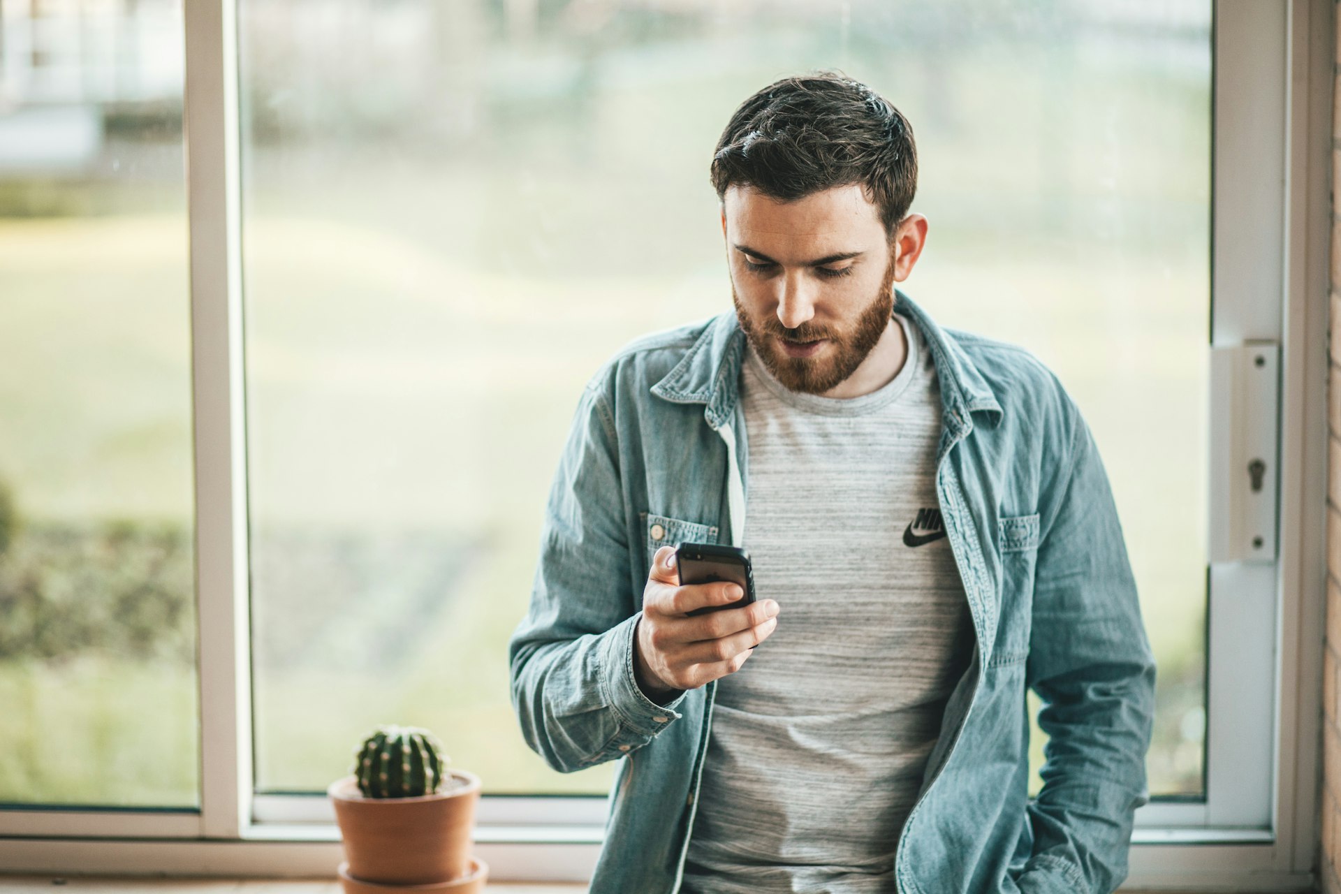 Man signing up for health insurance on his phone